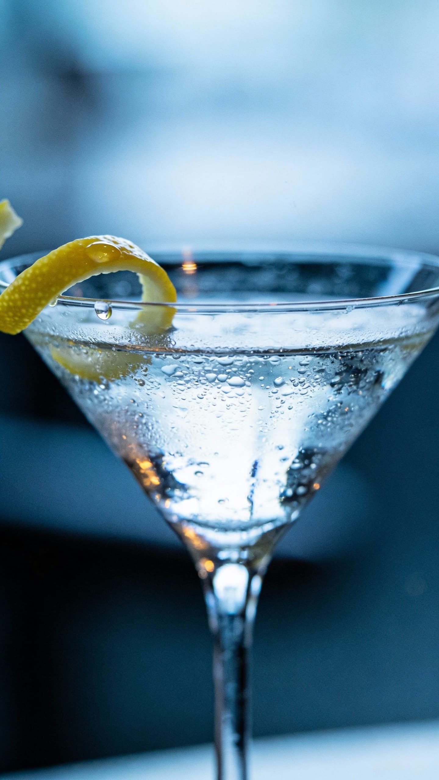 Chilled gin martini with lemon twist, coupe glass